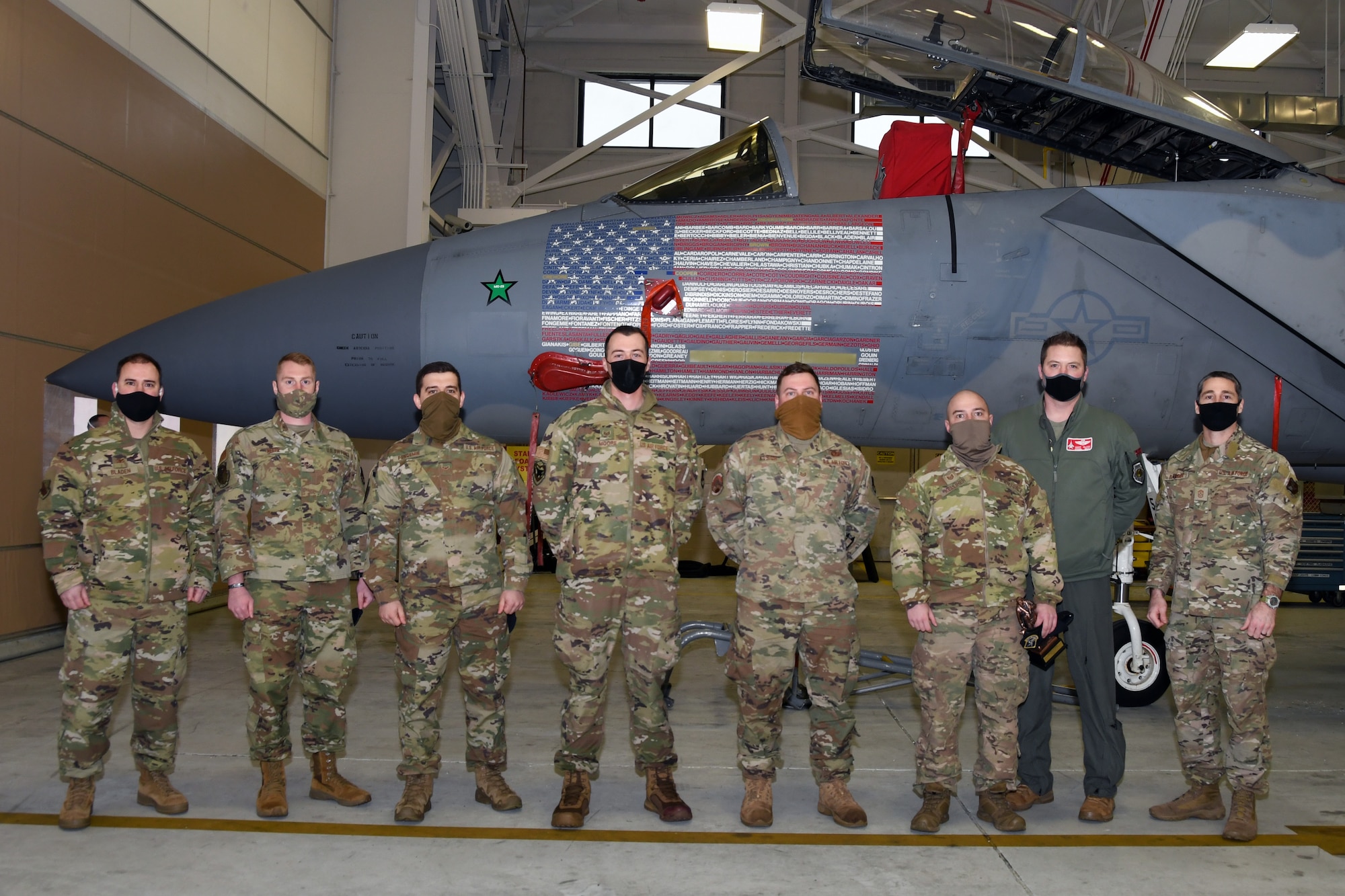 104th Fighter Wing 2020 Annual Award winners pose for a photo in front of an F-15C Eagle at Barnes Air National Guard Base, Massachusetts. The 104FW held an Annual Award ceremony which recognized the 104FW’s top performers in 2020. (U.S. Air National Guard photo by Staff Sgt. Hanna Smith)