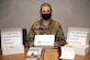 Tech. Sgt. Janna L. Ybarra, readiness noncommissioned officer, Airman and Family Readiness Center at Edwards Air Force Base, displays the contents of an Operation Strongheart kit, Jan. 28.