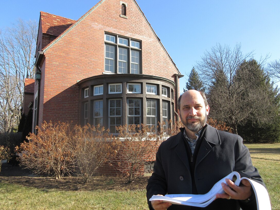 Steve Byington, the 88th Civil Engineer Group’s cultural resources manager, reviews architectural plans at the Brick Quarters on Wright-Patterson Air Force Base. Contributed photo