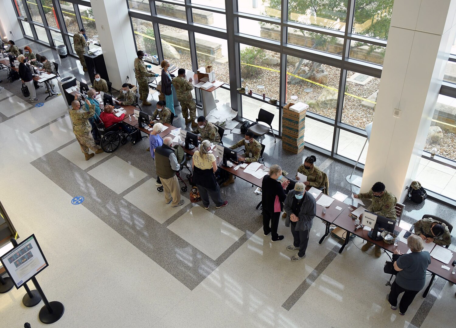 Medics from the 59th Medical Wing vaccinate San Antonio Military Health System beneficiaries Feb. 6 at Wilford Hall Ambulatory Surgical Center at Joint Base San Antonio-Lackland.