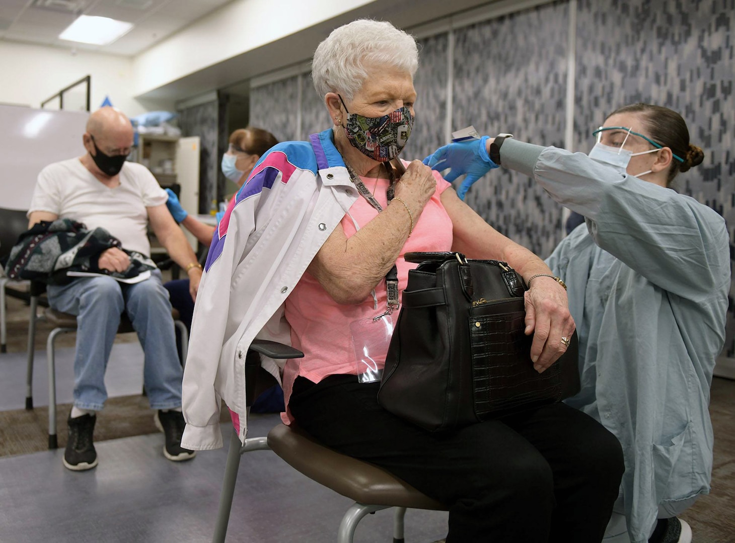 A 59th Medical Wing medic vaccinates a San Antonio Military Health System beneficiary Feb. 6 at Wilford Hall Ambulatory Surgical Center at Joint Base San Antonio-Lackland.