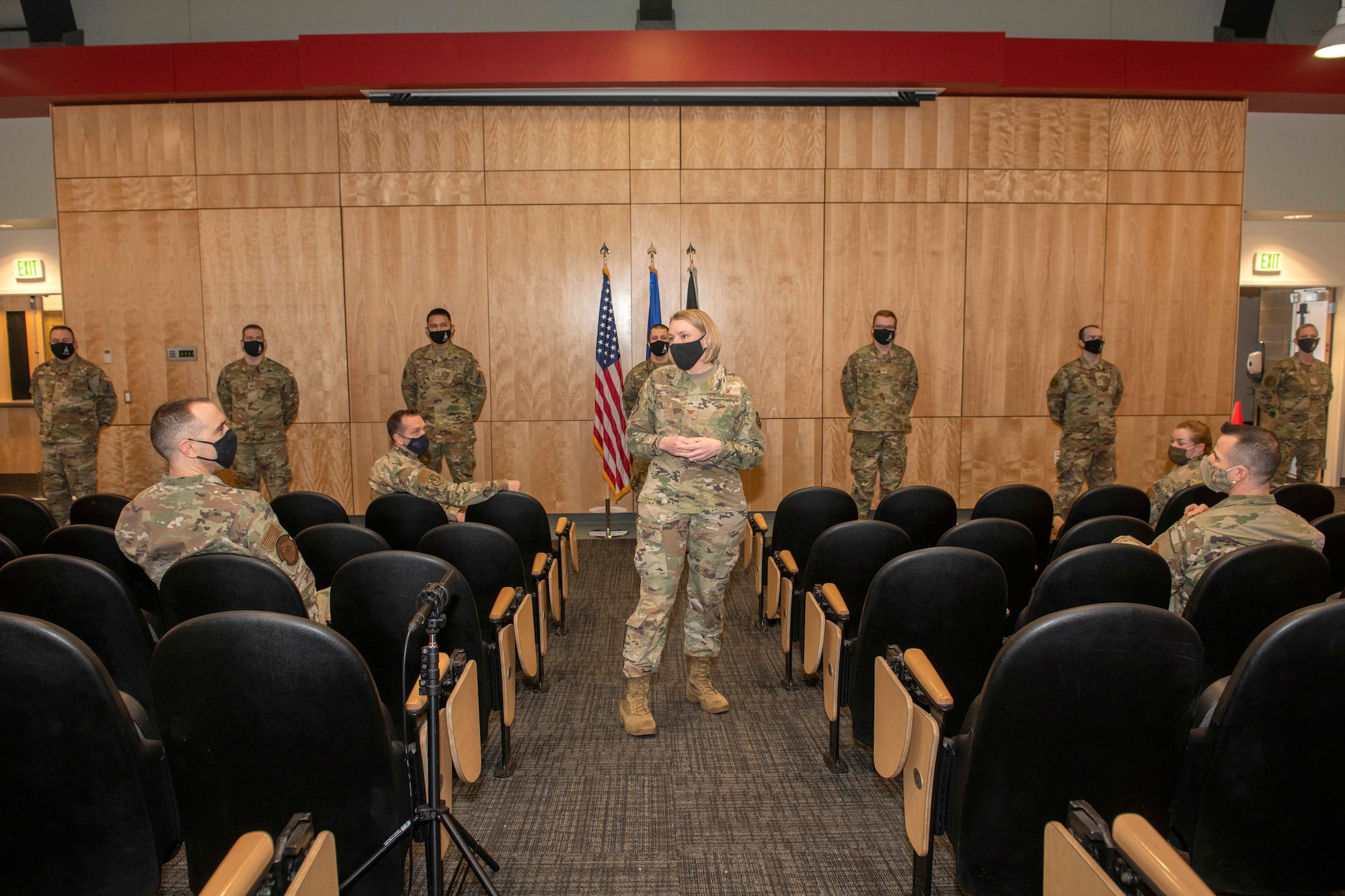 U.S. Air Force Col. Kirsten Aguilar, Joint Base Elmendorf-Richardson and 673d Air Base Wing commander, gives opening remarks during a U.S. Space Force transfer ceremony at Joint Base Elmendorf-Richardson, Alaska, Feb. 11, 2021. During the ceremony, JBER had seven Airmen earn their new title of Guardian by officially swearing into the newest branch of the armed forces.