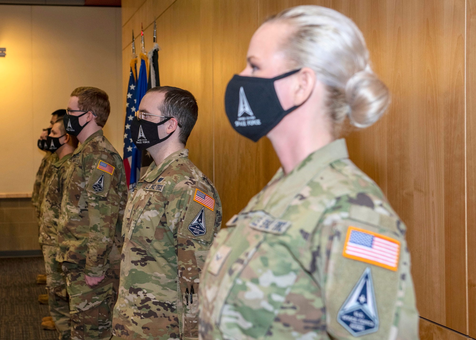 U.S. Airmen prepare to take the Oath of Enlistment into the U.S. Space Force during a transfer ceremony at Joint Base Elmendorf-Richardson, Alaska, Feb. 11, 2021. During the ceremony, JBER had seven Airmen earn their new title of Guardian by officially swearing into the newest branch of the armed forces.