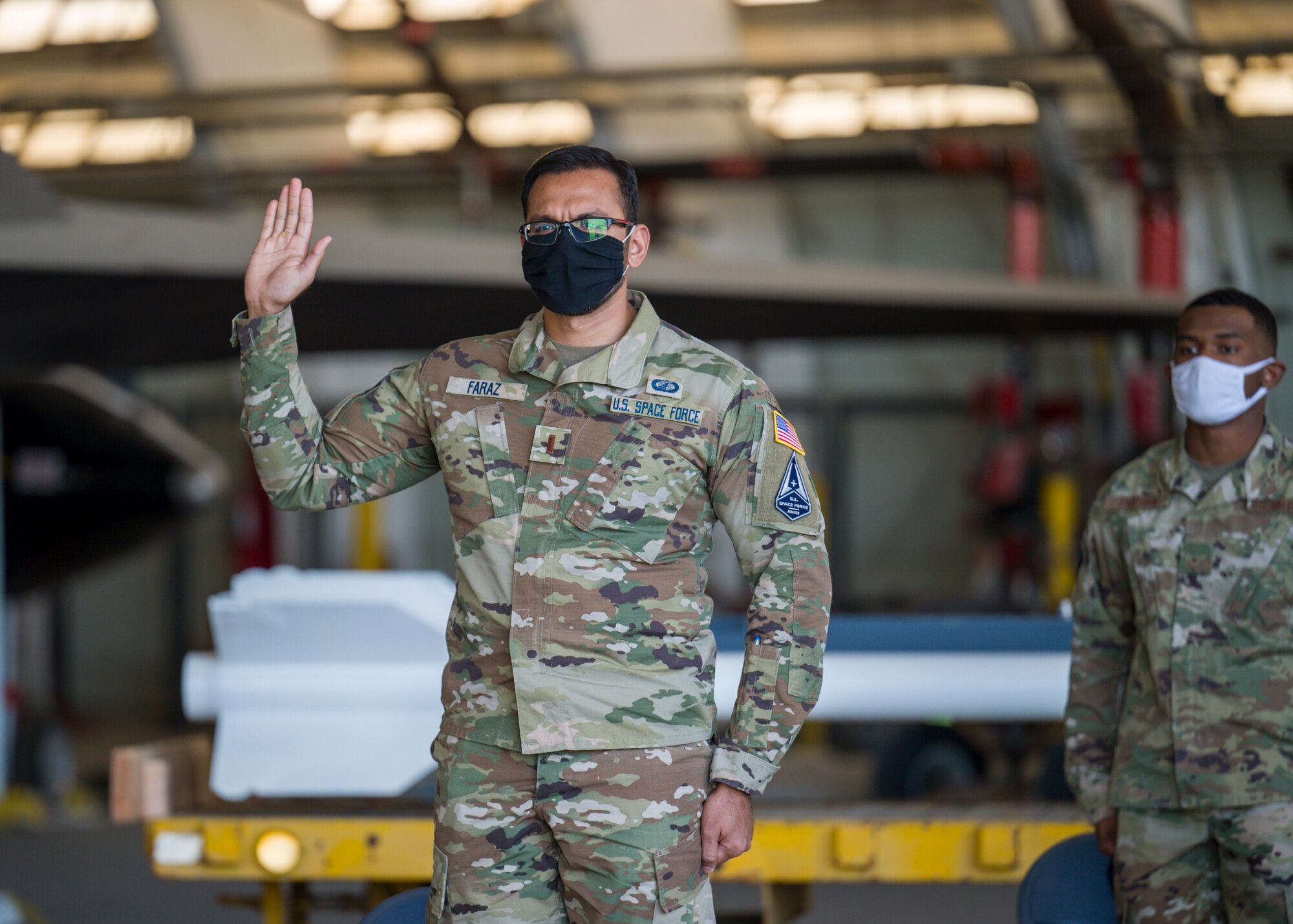 2nd Lt. Qazi Faraz, 773rd Test Squadron, originally of Houston, Texas, recites the oath of office during a Space Force Transfer Ceremony at Edwards Air Force Base, California, Feb. 11. (Air Force photo by Giancarlo Casem)