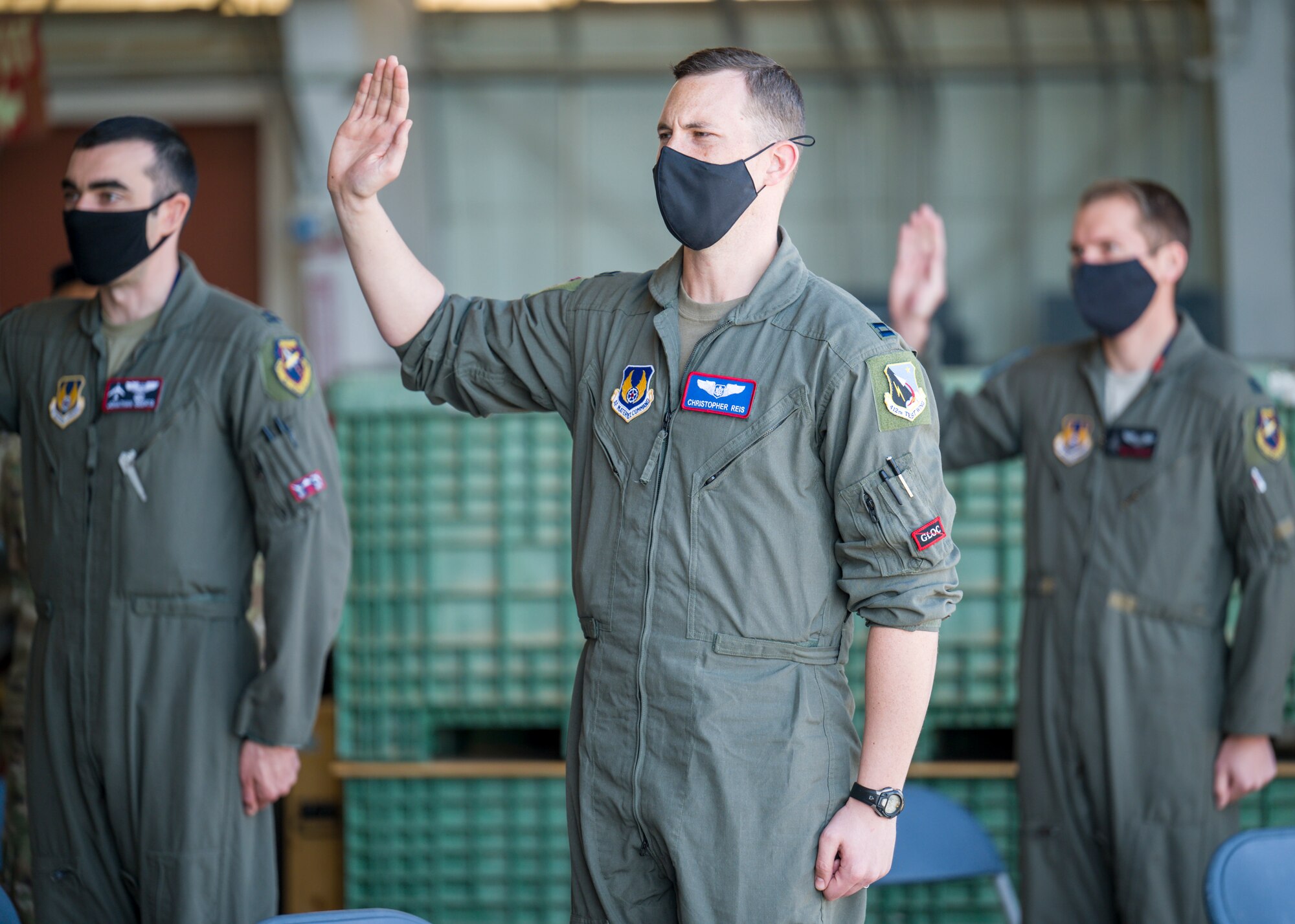 Capt. Christopher Reis, recites the oath of office during a Space Force Transfer Ceremony at Edwards Air Force Base, California, Feb. 11. (Air Force photo by Giancarlo Casem)