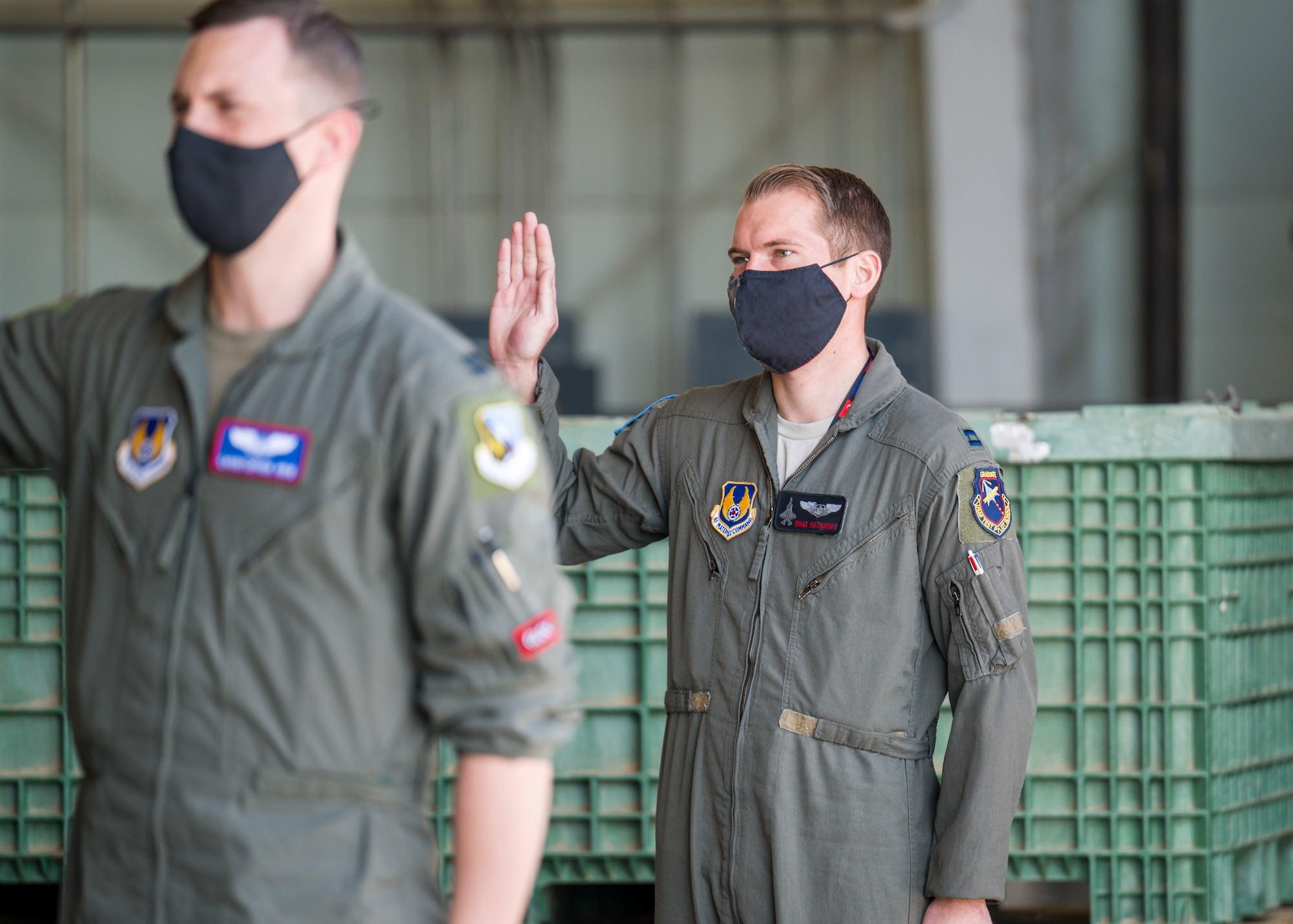 Capt. Kyle Hathaway, 461st Flight Test Squadron, originally of Portland, Oregon, recites the oath of office during a Space Force Transfer Ceremony at Edwards Air Force Base, California, Feb. 11. (Air Force photo by Giancarlo Casem)