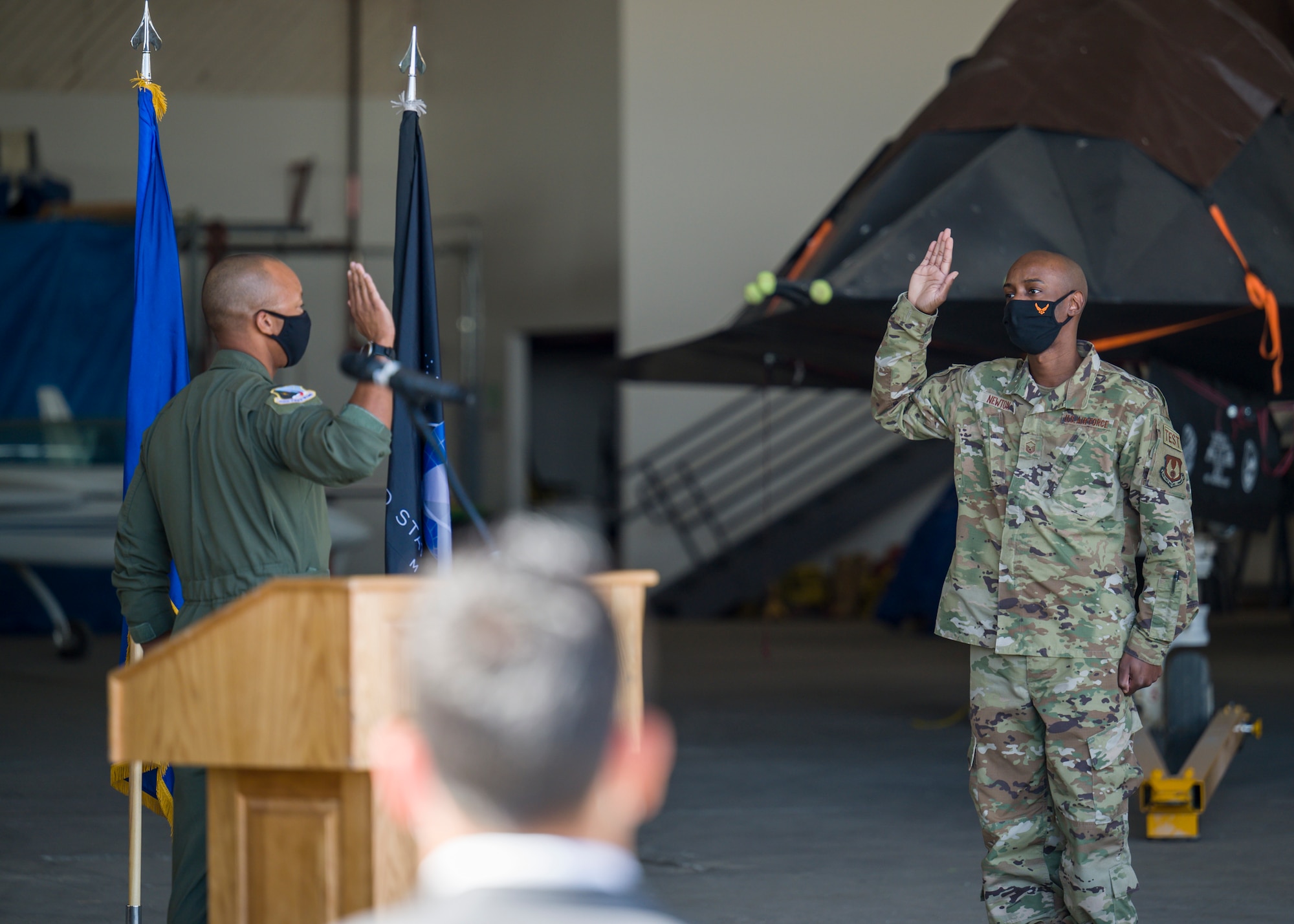 Master Sgt. Sheldon Newton, 412th Communications Squadron, originally of Watha, North Carolina, recites oath of enlistment during a Space Force Transfer Ceremony at Edwards Air Force Base, California, Feb. 11. (Air Force photo by Giancarlo Casem)