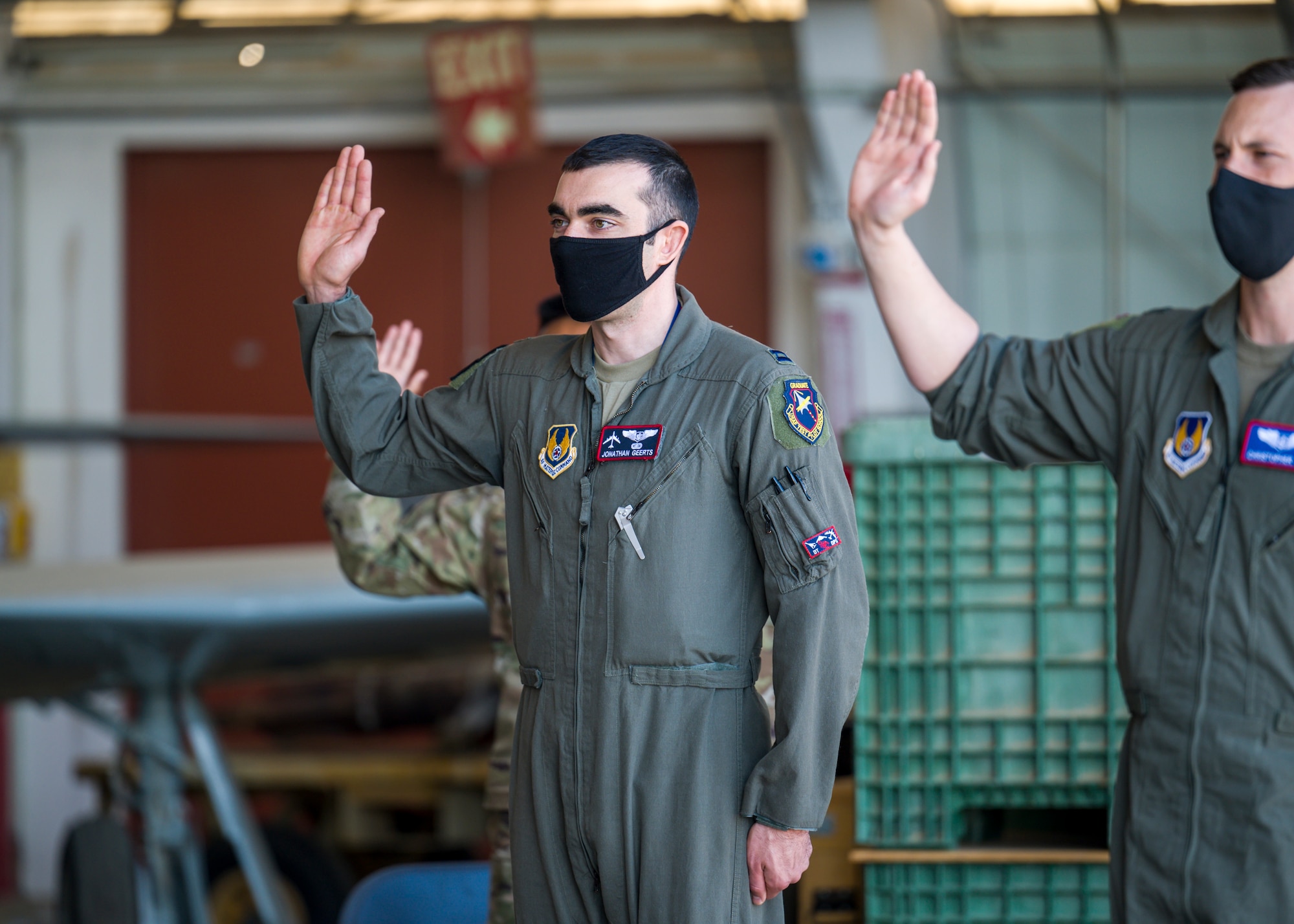 Capt. Jonathan Geerts, 419th Flight Test Squadron, originally of Berwyn, Pennsylvania, recites the oath of office during a Space Force Transfer Ceremony at Edwards Air Force Base, California, Feb. 11. (Air Force photo by Giancarlo Casem)