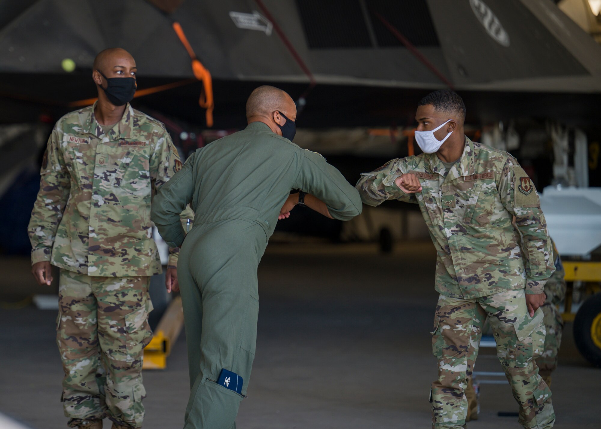 Airman Rashon Pradier, 412th Communications Squadron, originally of Lewisville, Texas, is congratulated by Col. Randel Gordon, 412th Test Wing Vice Commander following his oath of enlistment during a Space Force Transfer Ceremony at Edwards Air Force Base, California, Feb. 11. (Air Force photo by Giancarlo Casem)