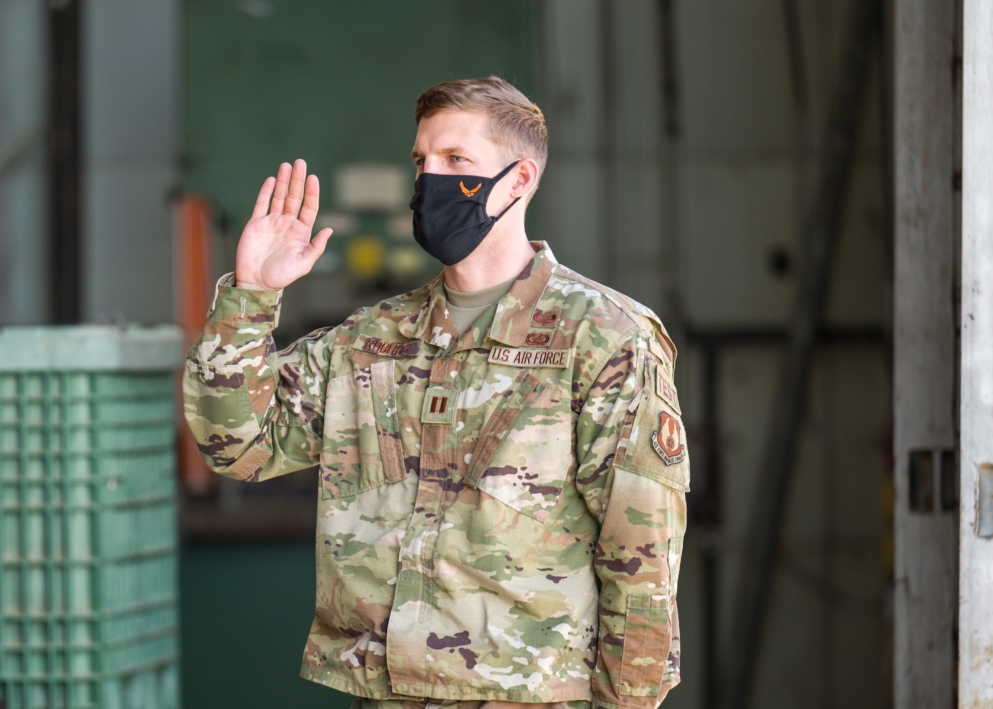 Capt. Karson Roberts, Air Force Research Laboratory, originally of Houston, Texas, recites the oath of office during a Space Force Transfer Ceremony at Edwards Air Force Base, California, Feb. 11. (Air Force photo by Giancarlo Casem)