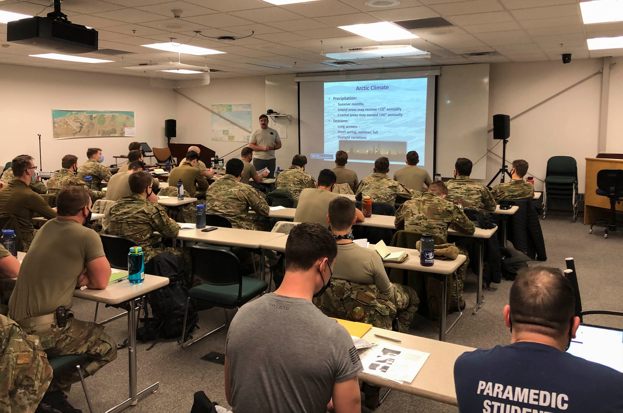 U.S. Air Force Senior Airman Collin Stock, a 66th Training Squadron, Detachment 1 survival, evasion, resistance and escape (SERE) specialist, teaches S-V81-C students about arctic survival at Utqiaġvik (Barrow), Alaska, Jan. 10, 2021.