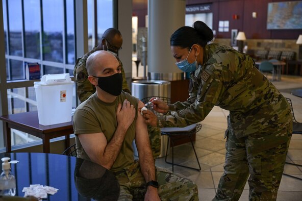 Airmen receive COVID-19 vaccination