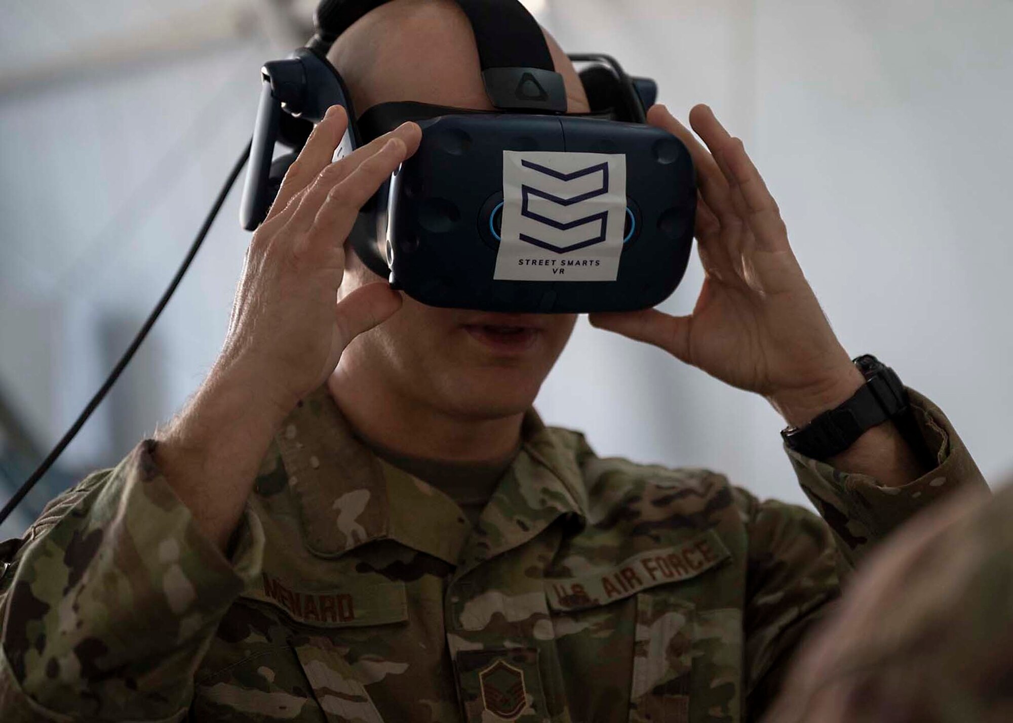 U.S. Air Force Master Sgt. Rory Menard, 380th Expeditionary Security Forces Squadron logistics and supply superintendent, calibrates a virtual reality (VR) system at Al Dhafra Air Base, United Arab Emirates, Jan. 20, 2020.