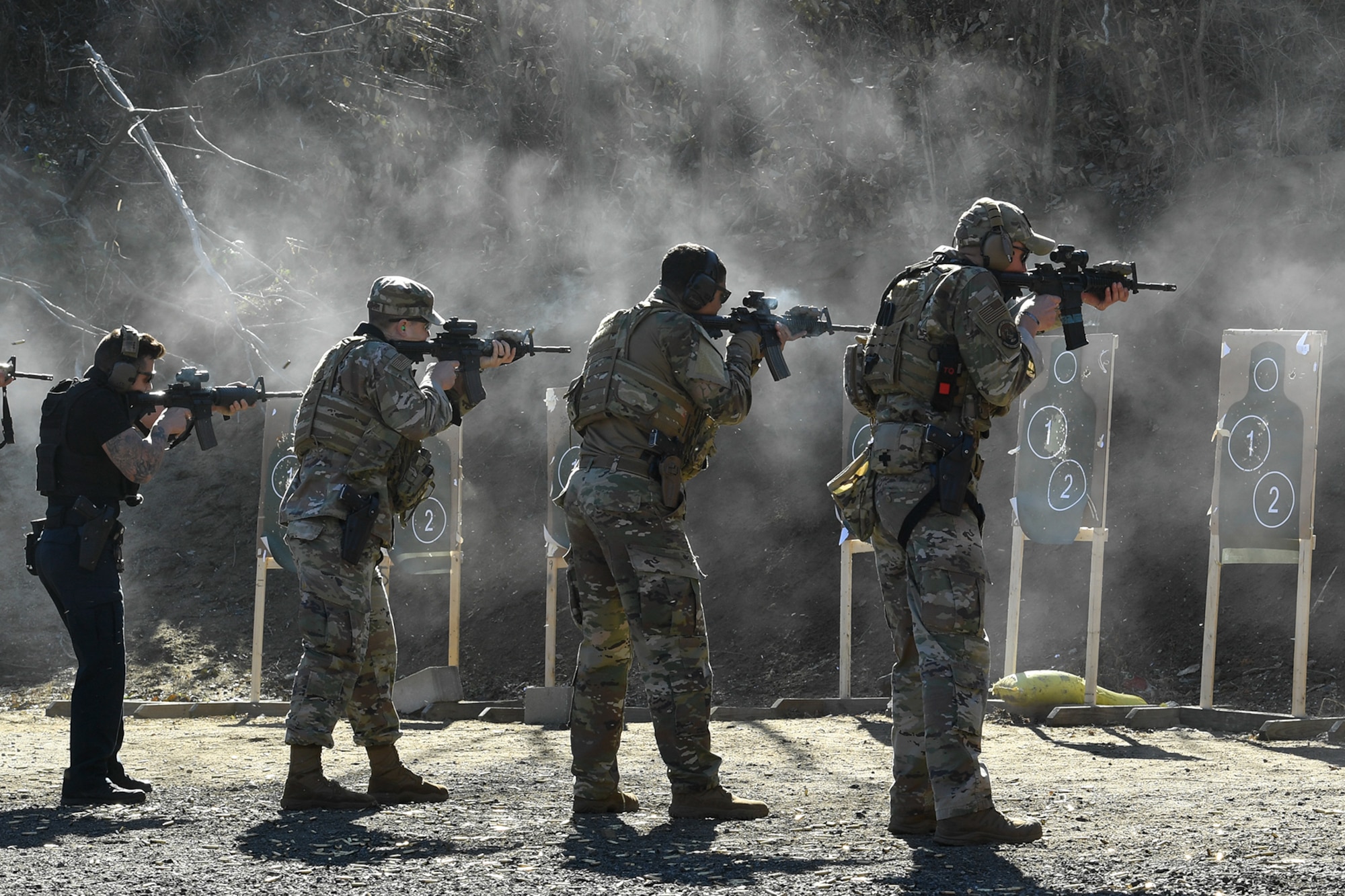 Members from the 66th Security Forces squadron shoot during a Controlled F.O.R.C.E. training event at Hanscom Air Force Base, Mass., Nov. 5, 2020. The 66 SFS was recently named the Air Force Materiel Command Outstanding Small Size Security Forces Unit for 2020. (U.S. Air Force photo by Linda LaBonte Britt)