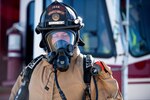Firefighters with Joint Base San Antonio prepare to participate in a live fire Aircraft Rescue Fire Fighting training Nov. 20, 2020, at Joint Base San Antonio-Kelly Field, Texas.