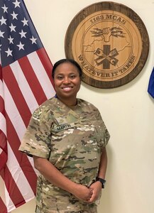 Kentucky National Guard Maj. Mitisha Martin Aug. 20, 2020, in Poland with the 1163rd Area Support Medical Company’s motto: “Whatever it takes.”