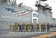 U.S. Marines and Sailors stand together with members of the Japanese Ground Self Defense Force, Australian Navy, U.S. Space Force, and U.S. Air Force, embarked together aboard amphibious assault ship USS America (LHA 6) in the Philippine Sea, Jan. 21.