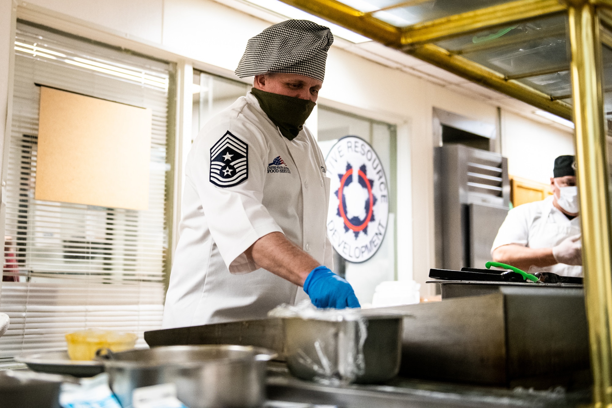 Chief Master Sgt. Paul Strazz, command chief of the 419th Fighter Wing, cooks omelets for Airmen on drill weekend Feb. 6, 2021, at Hill Air Force Base, Utah. Senior leadership from the 419th FW volunteered to help cook and serve at the Hillcrest Dining Facility.