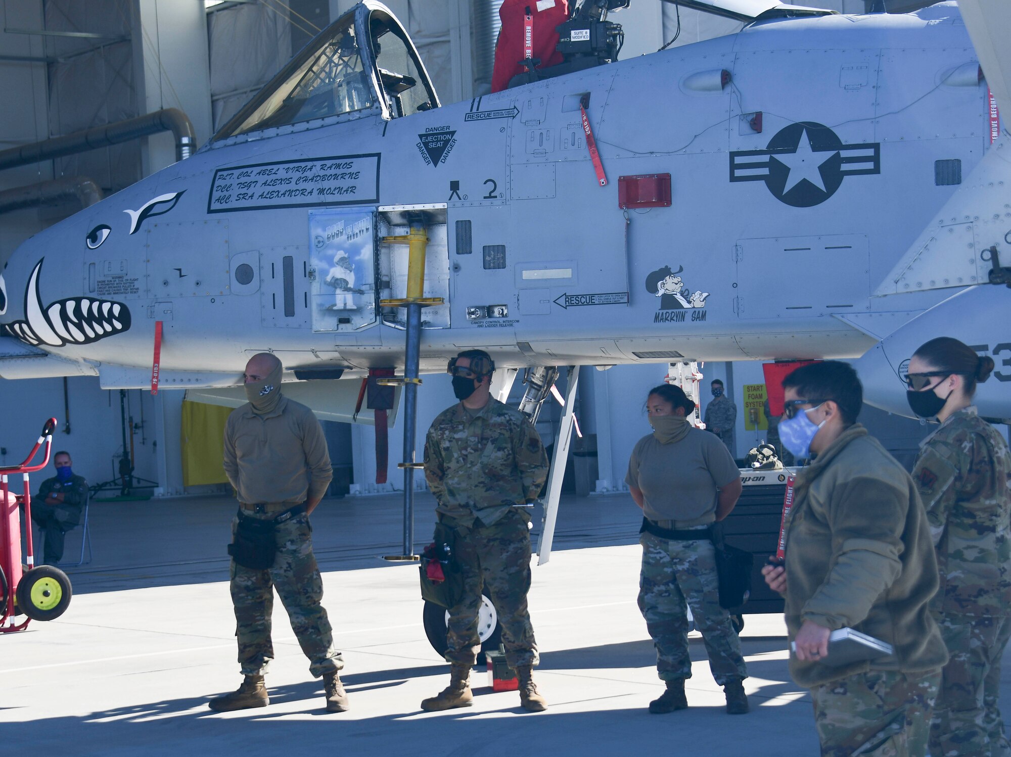 924th Aircraft Maintenance Unit load crew stand beside A-10 Thunderbolt II