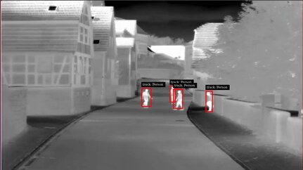 IMAGE: DAHLGREN, Va. – Several potential targets walk in an urban setting as Intelligent Tracker automatically generates their optical target tracks. The Intelligent Tracker – a new product developed by Naval Surface Warfare Center Dahlgren Division (NSWCDD) – will increase the Army’s Next Generation Combat Vehicle’s intelligent fire control capability to control its medium and large caliber weapon systems. Optical target tracks are generated automatically for use in direct fire weapon systems. The tracks are used in conjunction with a fire control system to lock onto a specific threat, easing the burden on the operator. Intelligent Tracker is capable of automatically generating target tracks for a wide range of targets and adding additional automation to the weapon control processes.  (U.S. Navy image/Released)