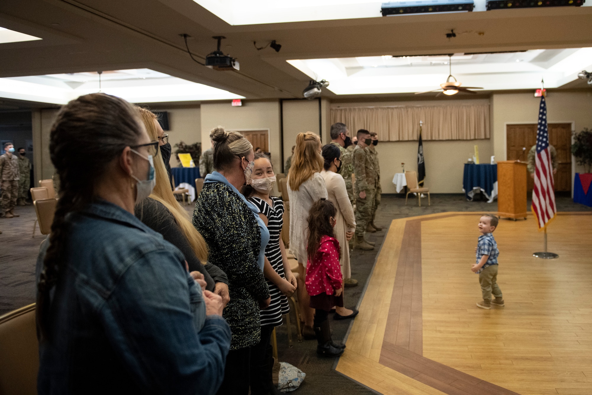 A photo of audience standing.
