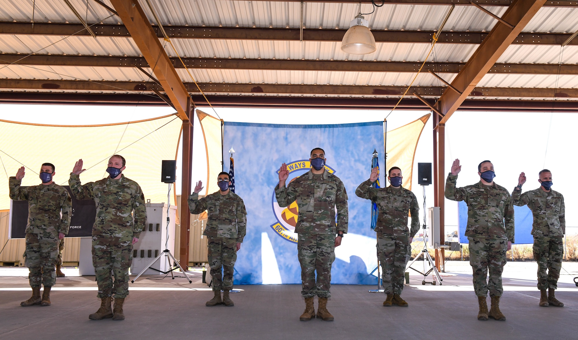 Members from the 607th Air Control Squadron recite the Oath of Office during a ceremonial swear-in, Feb. 5, 2021, at Luke Air Force Base, Arizona.