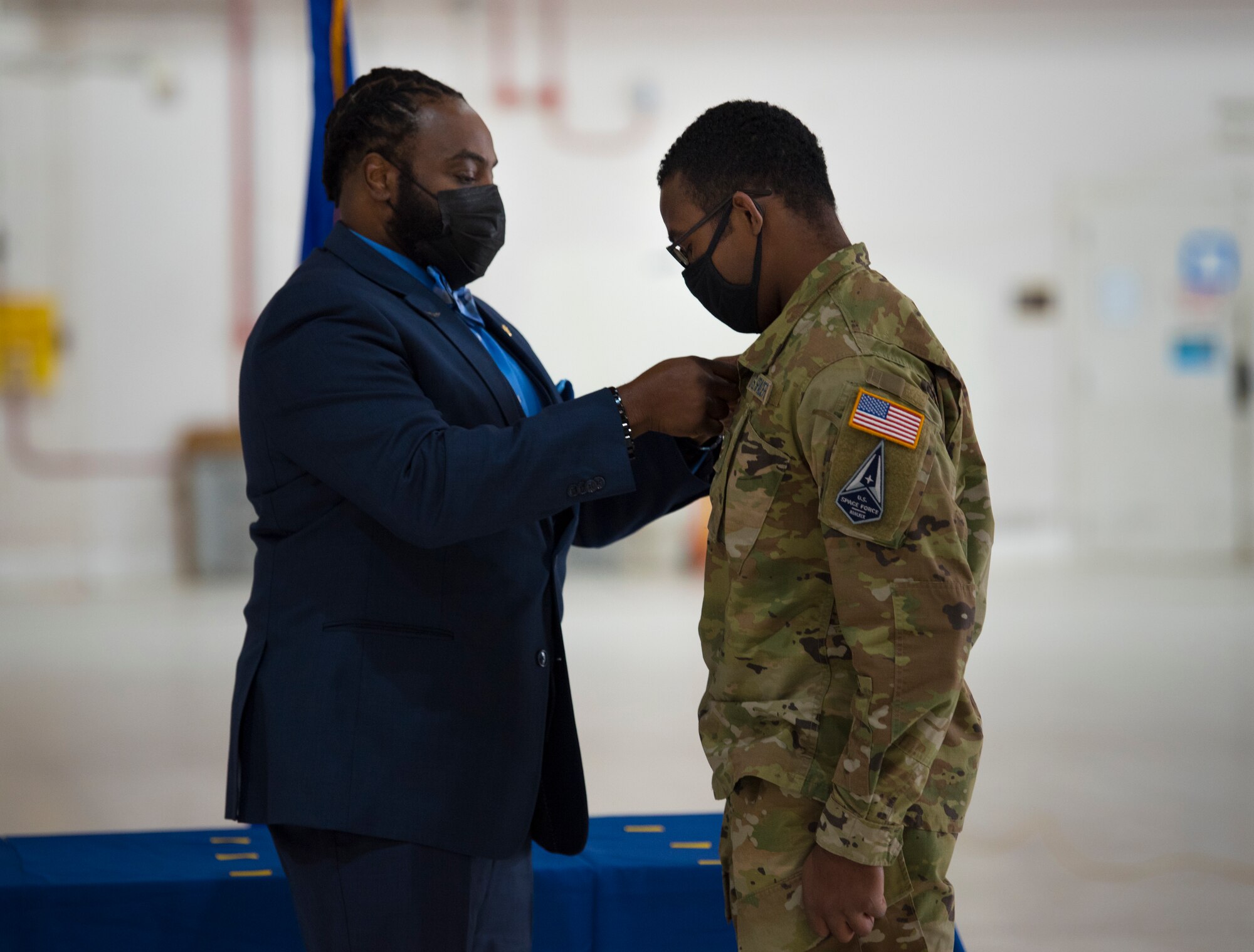 Holloman Air Force Base and Fort Bliss, Texas, Airmen take the Oath of Enlistment during U.S. Space Force transfer ceremony, Feb. 12, 2021, on Holloman Air Force Base, New Mexico. A total of 19 Airmen were chosen to transfer over to the U.S. Space Force. (U.S. Air Force photo by Airman 1st Class Jessica Sanchez)