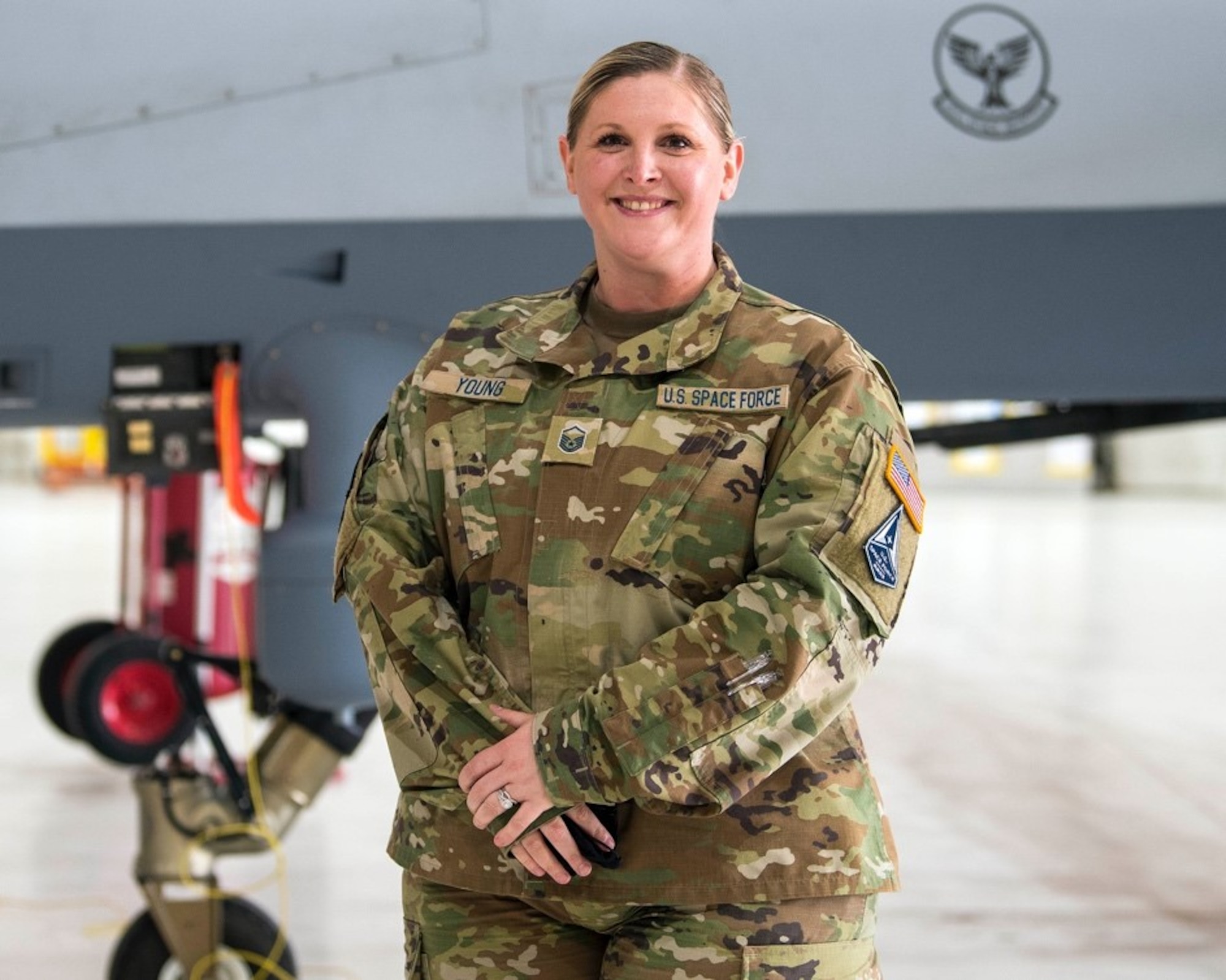U.S. Space Force Master Sgt. Brittani Young, 49th Communications Squadron, poses for a photo, Feb. 12, 2021, on Holloman Air Force Base, New Mexico. The USSF is currently working on transferring over 6,000 Airmen from the Air Force to the Space Force by mid-2021. In Sept. 2020, the Air Force transitioned more than 2,400 active-duty Airmen in space operations and space system operations to begin establishing, maintaining, and preserving U.S. freedom of operations in space. (U.S. Air Force photo by Airman 1st Class Jessica Sanchez)