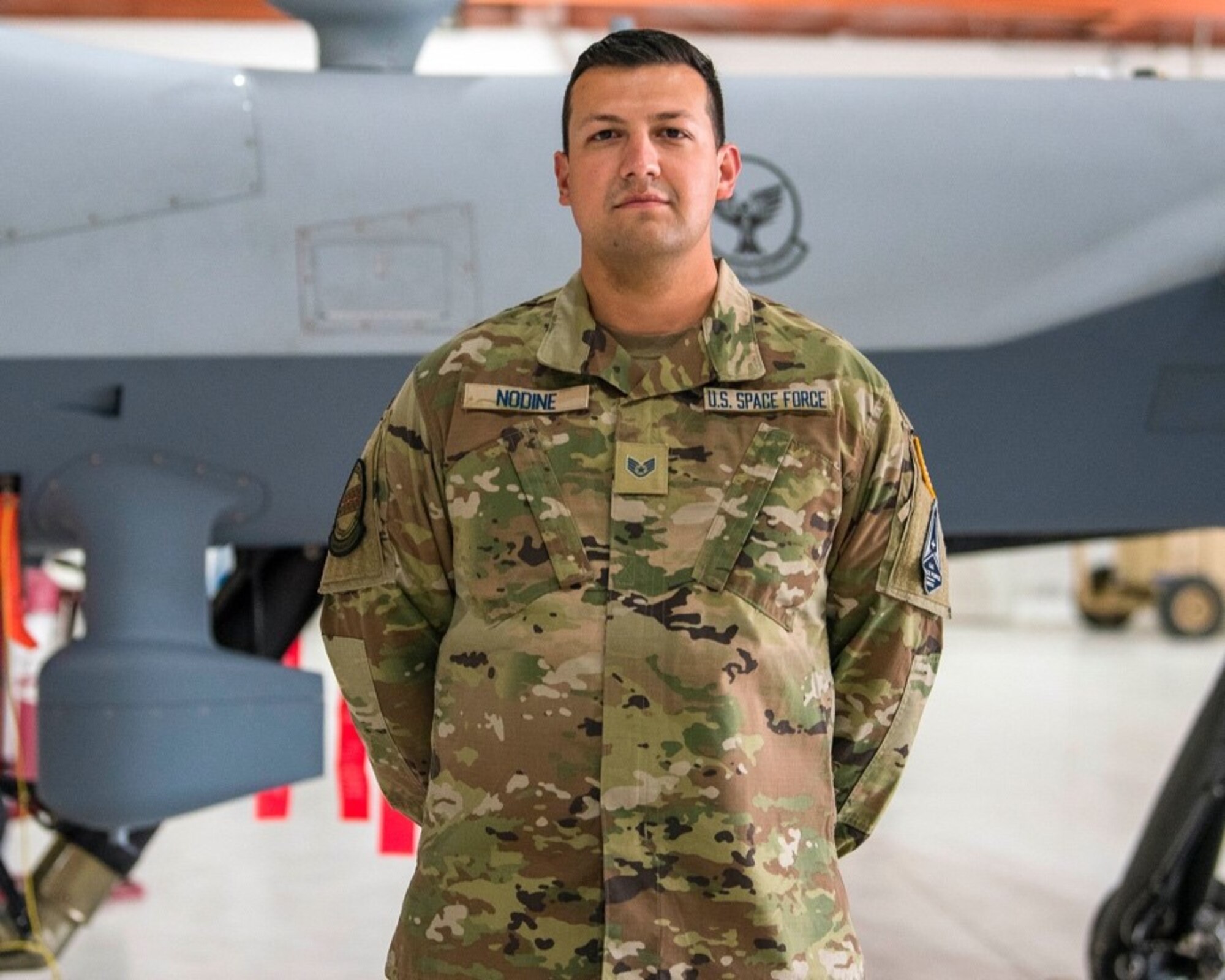 U.S. Space Force Sgt. Steven Nodine, 49th Communications Squadron, poses for a photo, Feb. 12, 2021, on Holloman Air Force Base, New Mexico. The USSF is currently working on transferring over 6,000 Airmen from the Air Force to the Space Force by mid-2021. In Sept. 2020, the Air Force transitioned more than 2,400 active-duty Airmen in space operations and space system operations to begin establishing, maintaining, and preserving U.S. freedom of operations in space. (U.S. Air Force photo by Airman 1st Class Jessica Sanchez)