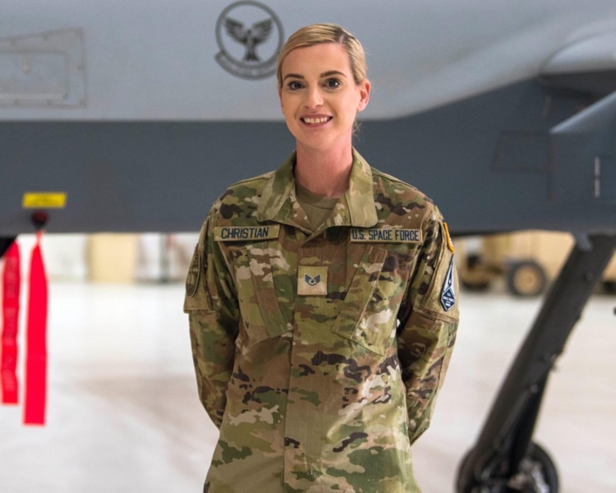 U.S. Space Force Sgt. Molly Christian, 49th Aircraft Maintenance Squadron, poses for a photo Feb. 12, 2021, on Holloman Air Force Base, New Mexico. The USSF is currently working on transferring over 6,000 Airmen from the Air Force to the Space Force by mid-2021. In Sept. 2020, the Air Force transitioned more than 2,400 active-duty Airmen in space operations and space system operations to begin establishing, maintaining, and preserving U.S. freedom of operations in space. (U.S. Air Force photo by Airman 1st Class Jessica Sanchez)