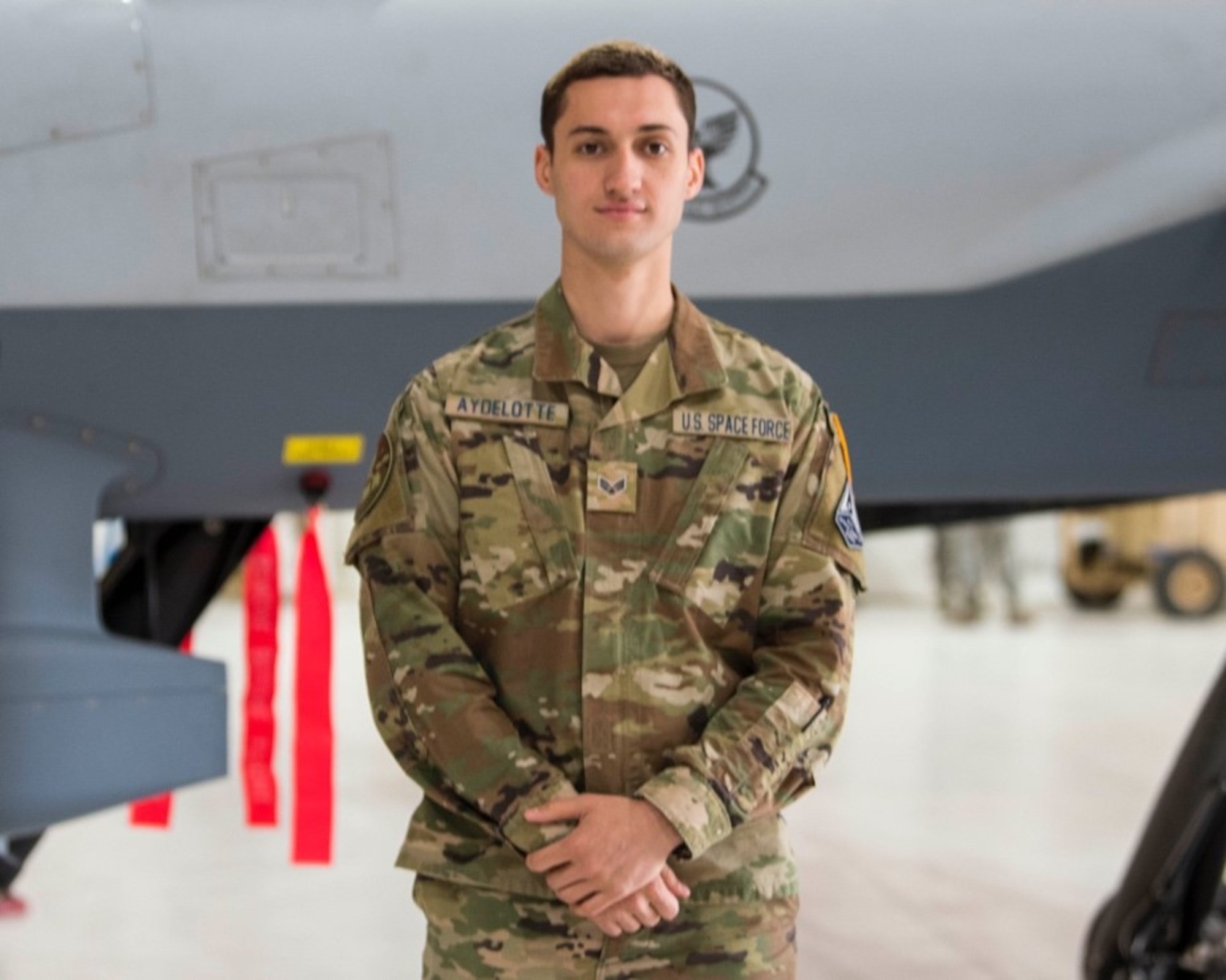 U.S. Space Force Specialist 4 Samuel Aydelotte, 49th Aircraft Maintenance Squadron, poses for a photo, Feb. 12, 2021, on Holloman Air Force Base, New Mexico. The USSF is currently working on transferring over 6,000 Airmen from the Air Force to the Space Force by mid-2021. In Sept. 2020, the Air Force transitioned more than 2,400 active-duty Airmen in space operations and space system operations to begin establishing, maintaining, and preserving U.S. freedom of operations in space. (U.S. Air Force photo by Airman 1st Class Jessica Sanchez)