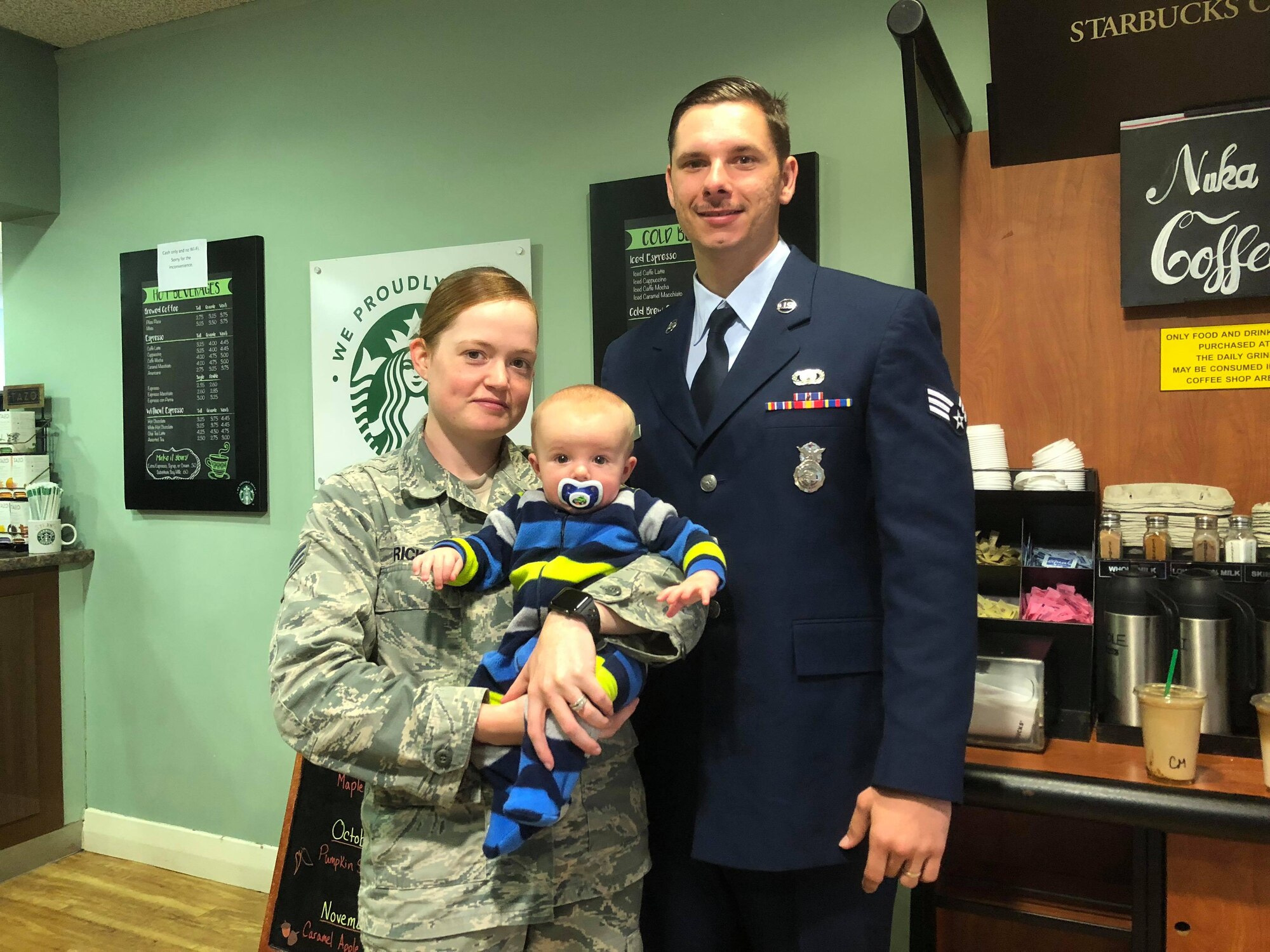 U.S. Air Force Senior Airmen Heather and Derek Ricks, 423rd Security Forces Squadron defenders, pose for a photo with their son Rylan at Royal Air Force Alconbury, England, Sept. 11, 2018. (Courtesy photo)