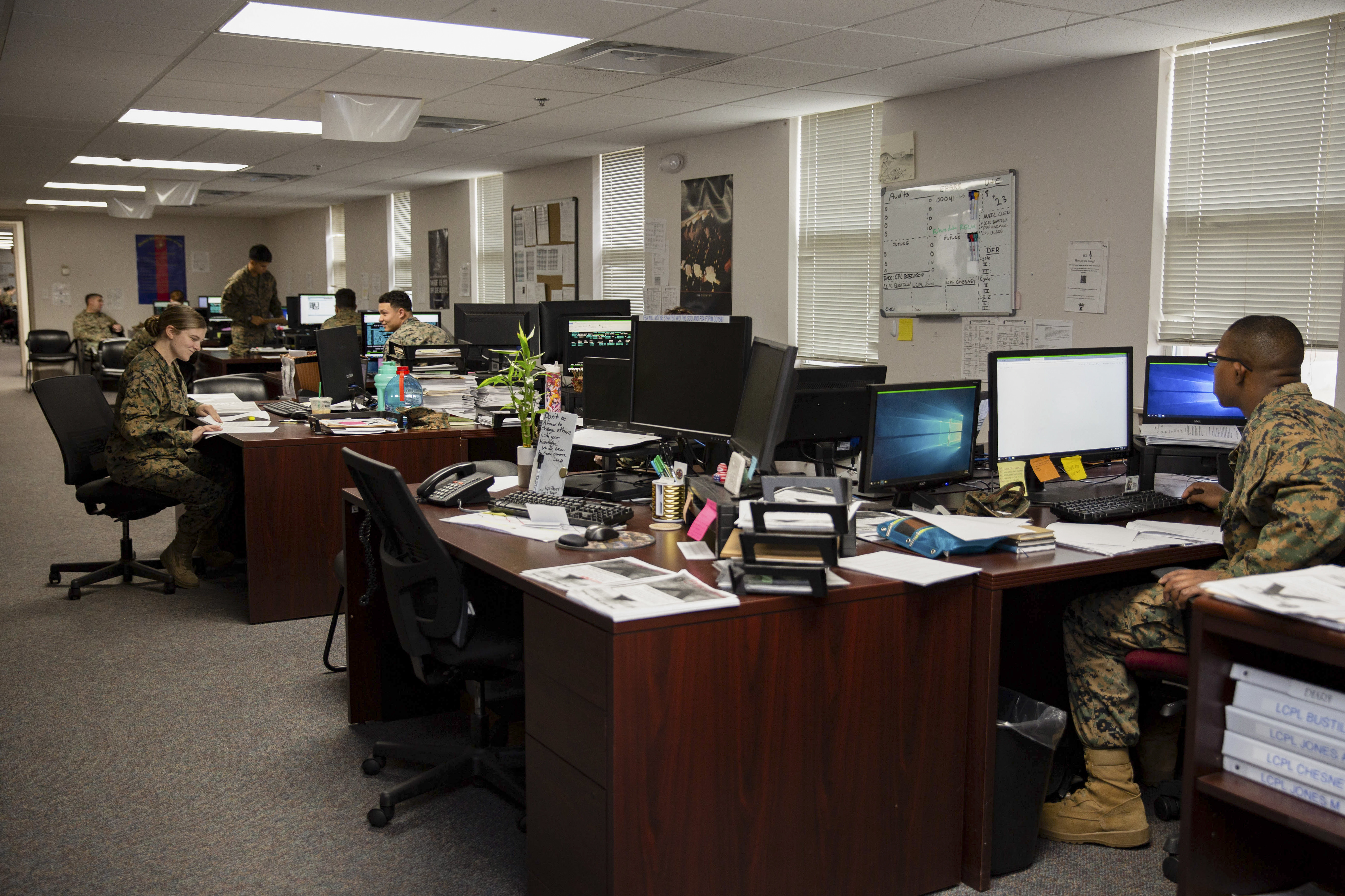 U.S. Marines with the Installation Personnel Administration Center (IPAC), Headquarters and Support Battalion, conduct daily administrative duties at Marine Corps Base Camp Lejeune, North Carolina, Jan. 16, 2020. The mission of the IPAC is to provide personnel administrative support and services to service members and family members to ensure military personnel records and pay accounts are accurate and properly maintained in order to prepare the individual for worldwide deployment with the operating forces. (U.S. Marine Corps photo by Cpl. Karina Lopezmata)