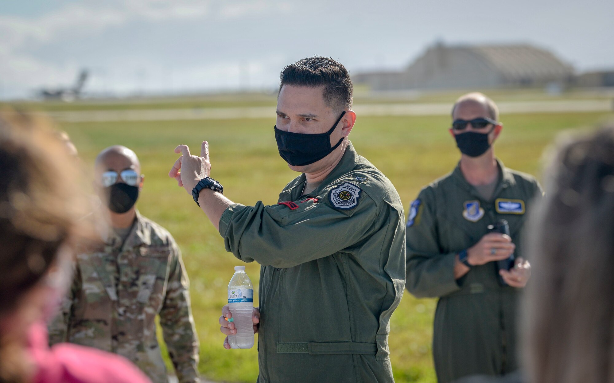U.S. Air Force Col. David Aragon, vice commander assigned to the 36th Wing, briefs Team Andersen Airmen and spouses during a group flight line engagement for exercise Cope North 2021 at Andersen Air Force Base, Guam, Feb. 11, 2021.