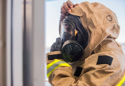 Staff Sgt. Mohamed Musa, from the Oregon National Guard 102nd CST, dons HAZMAT gear during the BAYEX 2021 exercise with CST units from Oregon, Nevada and California in Northern California Feb. 1-5, 2021. The exercise tested the ability to respond to training scenarios in the San Francisco Bay Area involving weapons of mass destruction emergencies.