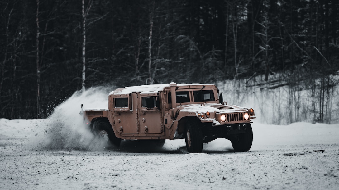 U.S. Marines participate in a tactical drivers training course on icy roads in Setermoen, Norway, Feb. 5.