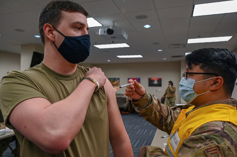 A person receives a vaccine