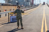 Norfolk Naval Shipyard (NNSY) Commander, Captain Dianna Wolfson, addresses shipyard personnel during a ribbon cutting ceremony Feb. 4. The ribbon cutting ceremony celebrates the completion of the $6,460,230 Borum Overpass restoration project.