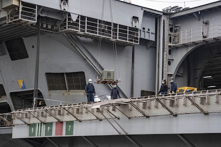 NORFOLK, Virginia. (Feb. 15, 2021) The Nimitz-class aircraft carrier USS Dwight D. Eisenhower (CVN 69) ) receives a shipment of the Moderna COVID-19 Vaccines while pierside at Naval Station Norfolk. (U.S. Navy photo by Mass Communication Specialist 2nd Class Joshua M. Tolbert/Released)