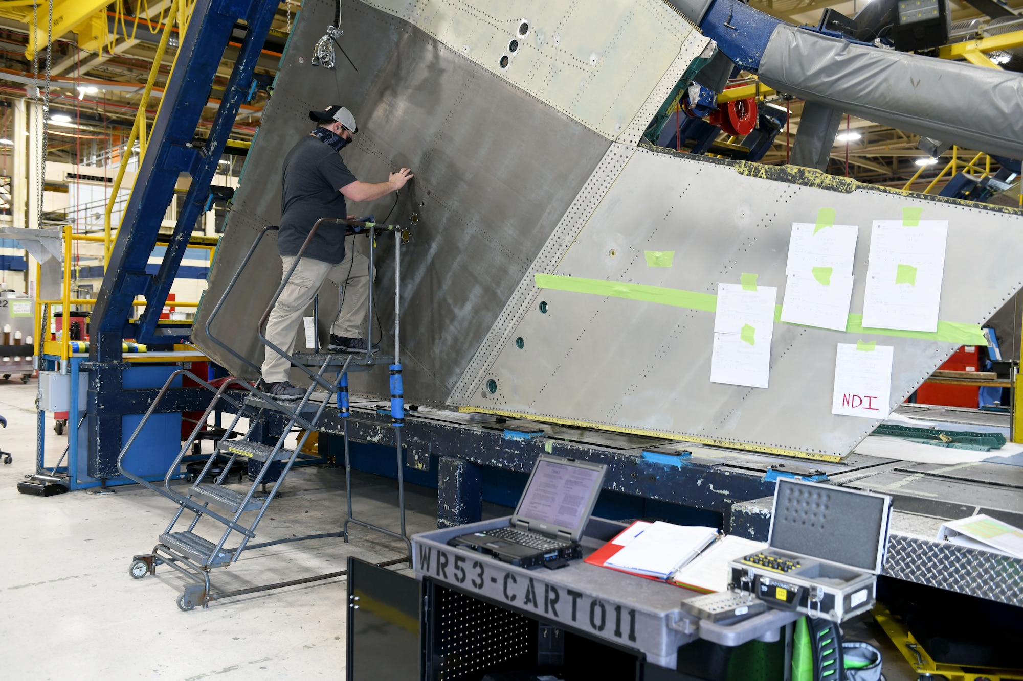 man working on aircraft