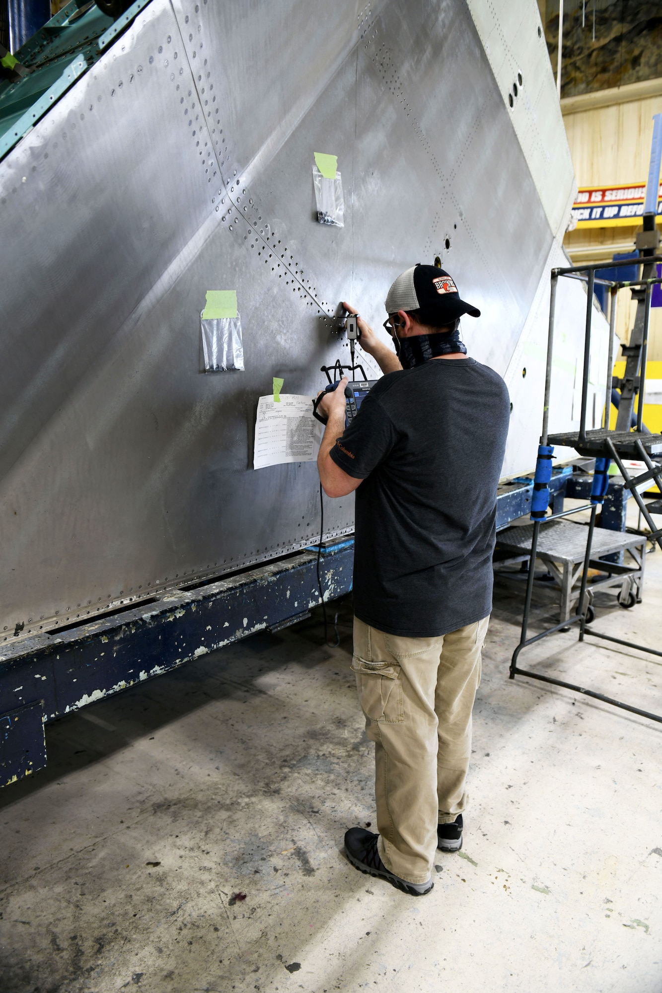 man working on aircraft