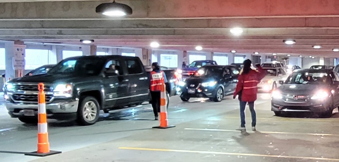 Sgt. 1st Class Cynthia Charles with the AMEDD Professional Management Command, volunteers with Veteran vaccine observation at the Atlanta VA Covid-19 drive-thru. 
Per CDC guidelines, all Veterans who received the vaccine at the drive thru, conducted a 15-minute observation before being released.