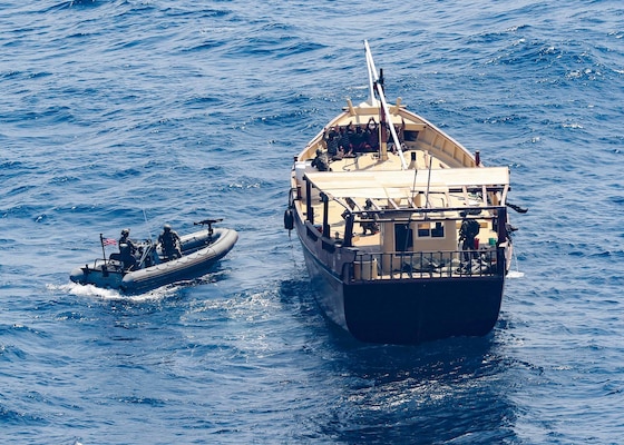 The guided-missile destroyer USS Winston S. Churchill (DDG 81), in accordance with international law, boarded a stateless dhow off the coast of Somalia and interdicted an illicit shipment of weapons and weapon components, Feb. 12.