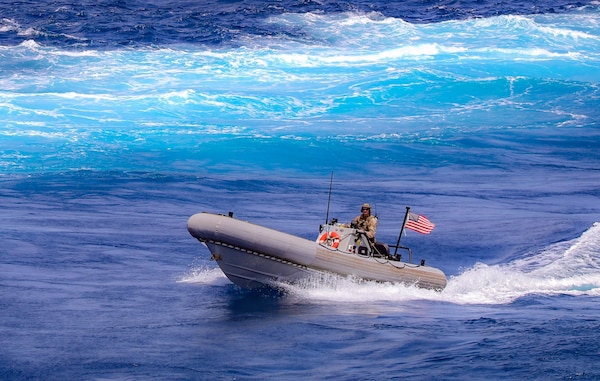 A Sailor assigned to the guided-missile destroyer USS Winston S. Churchill (DDG 81), in accordance with international law, boarded a stateless dhow off the coast of Somalia and interdicted an illicit shipment of weapons and weapon components, Feb. 12.