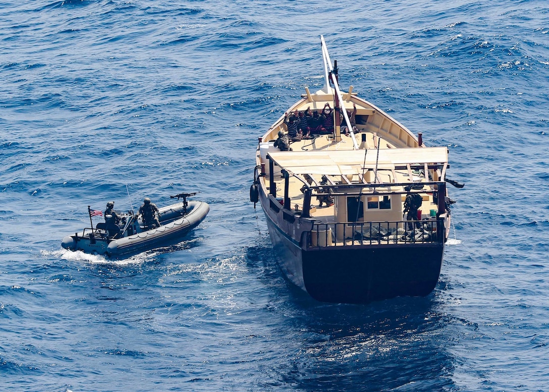 INDIAN OCEAN (Feb. 12, 2021) The guided-missile destroyer USS Winston S. Churchill (DDG 81), in accordance with international law, boarded a stateless dhow off the coast of Somalia and interdicted an illicit shipment of weapons and weapon components, Feb. 12. Maritime security operations, as conducted by the U.S. 5th Fleet, entail routine patrols to determine pattern of life in the maritime environment as well as to enhance mariner-to-mariner relations. These operations reassure allies and partners and preserve freedom of navigation and free flow of commerce. (U.S. Navy photo by Mass Communication Specialist 3rd Class Louis Thompson Staats IV)