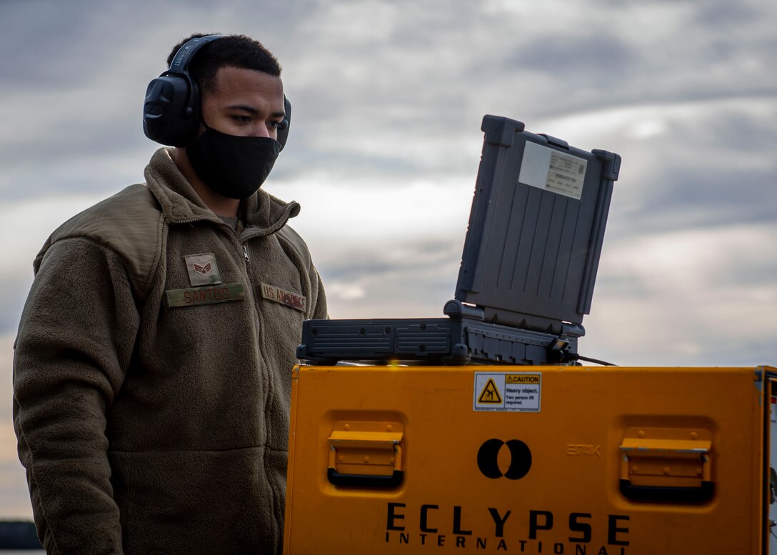 Senior Airman Thiago Santos, 4th Fighter Readiness Squadron electronics technician, uses a laptop and Eclypse tester at Seymour Johnson Air Force Base, North Carolina, Feb. 3, 2021.