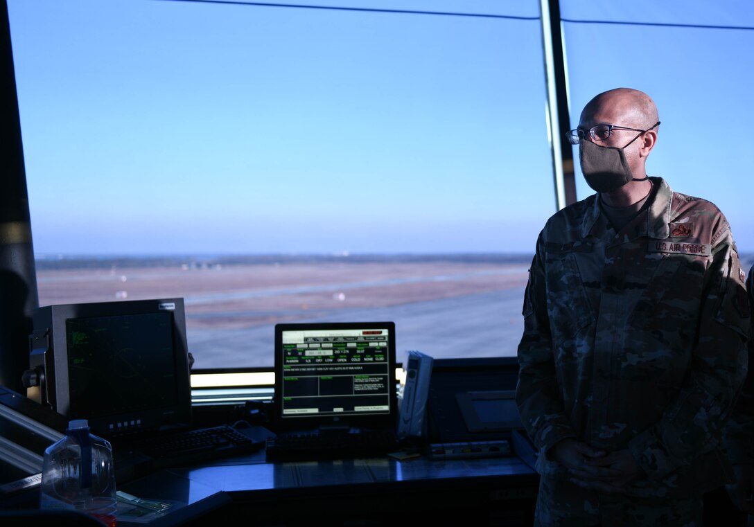 Lt. Col. Yogi Lebby looks around the air traffic control tower.