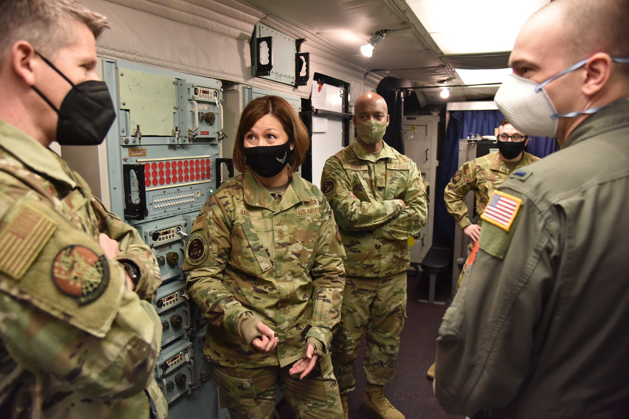 Chief Master Sgt. of the Air Force JoAnne S. Bass receives a launch control center tour from missileers during her tour of a missile alert facility Feb. 9, 2021, near Malmstrom Air Force Base, Mont. Missileers are responsible for potential launches of Minuteman III intercontinental ballistic missiles, the most responsive leg of the nuclear triad.
