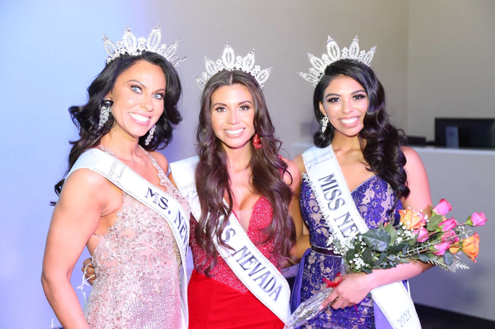 Maj. Jennifer stands with other participants in the United States of America's Mrs. Nevada pageant for a photo.