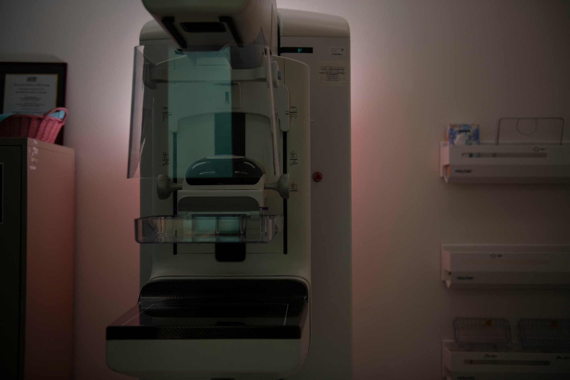 A piece of medical equipment in a dark room